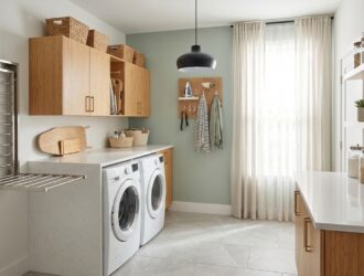 Modern laundry room makeover with sleek storage, stylish lighting, and efficient layout.
