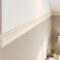 Elegant crown molding installed at wall‑ceiling junction, adding a sophisticated finish