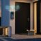 Smart video doorbell on front porch delivering live feed for home security.