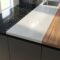 Selection of durable kitchen countertops: granite, quartz, marble, and laminate surfaces.