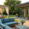 Modern outdoor living space with stylish patio, lounge furniture and smart lighting trend
