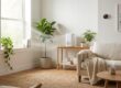 Modern home with air purifier, plants, and open windows for cleaner indoor air.